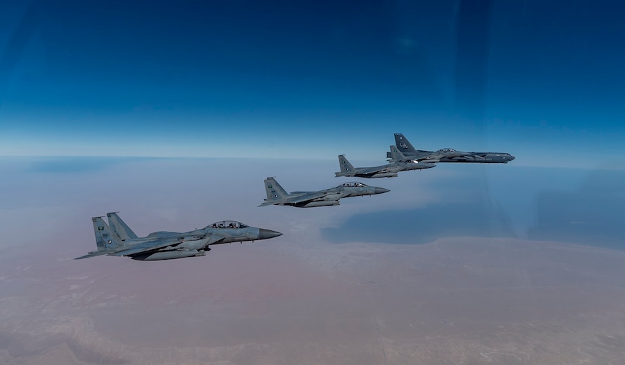 A U.S. Air Force B-52 Stratofortress  from the 2nd Bomb Wing, Barksdale Air Force Base, LA, flew with Royal Saudi Arabian Air Force F-15SAs during a bomber task force mission over the U.S. Central Command area of responsibility, Jan. 27, 2021. The bomber deployment underscores the U.S. Military's commitment to regional security and demonstrates a unique ability to rapidly deploy on short notice. The B-52 is a long-range, heavy bomber that is capable of flying at high subsonic speeds of altitudes of up to 50,000 feet and provides the United States with a global strike capability.