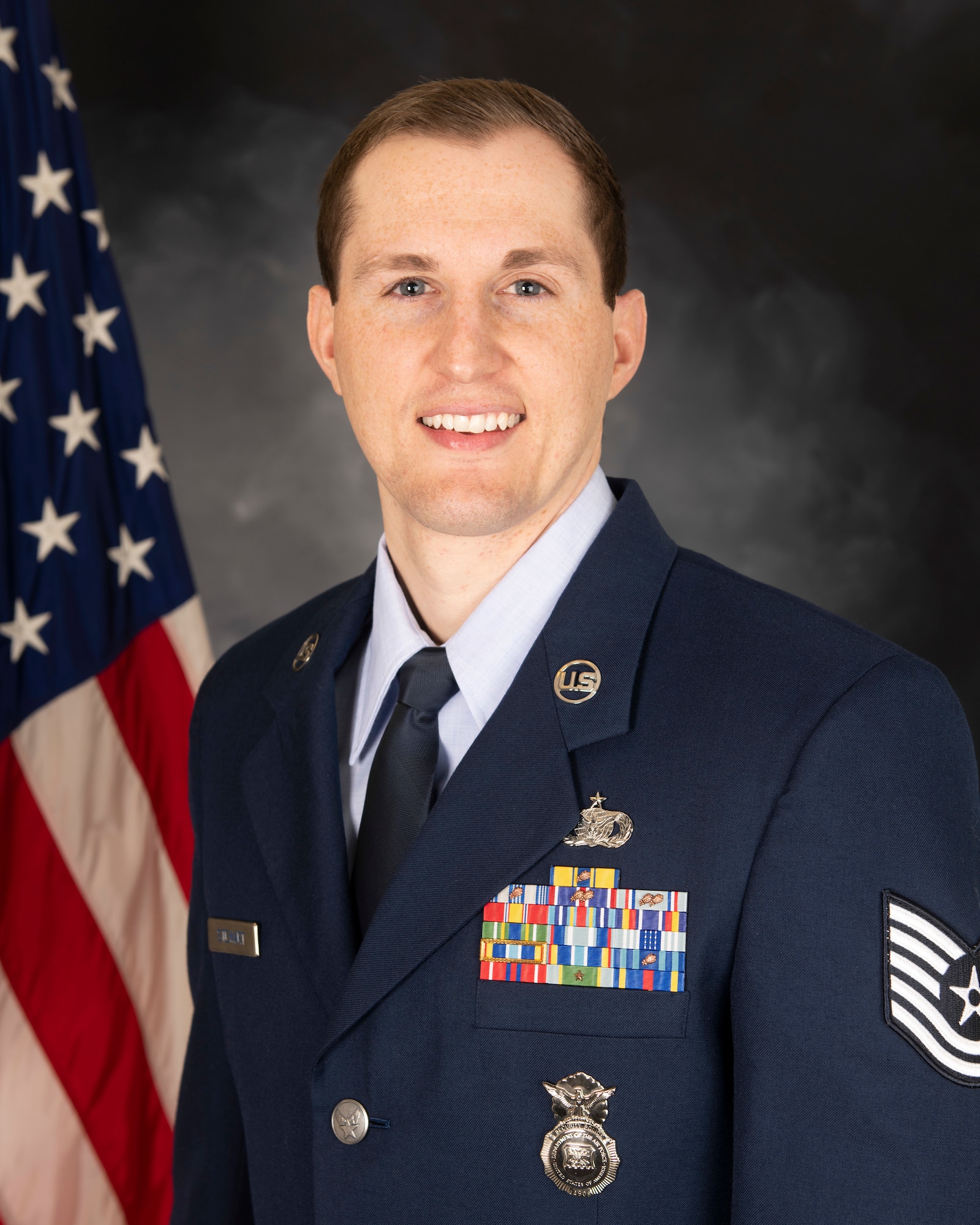 U.S. Air Force Tech. Sgt. Jon Stewart, 423rd Security Forces Squadron noncommissioned officer in charge of operations, poses for a studio photo at Royal Air Force Alconbury, England, Jan. 21, 2021. (U.S. Air Force photo by Senior Airman Jennifer Zima)
