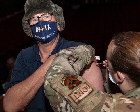 M1 Services contractor receives COVID-19 vaccine