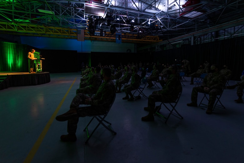 A photo of the 23d Wing commander speaking to Airmen during a ceremony