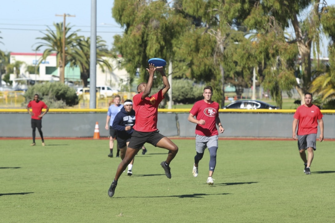 U.S. Marines with Headquarters and Headquarters Squadron participate in an ultimate Frisbee tournament on Marine Corps Air Station Miramar, California, Nov. 17, 2020. As part of the monthly squadron Warrior Games competition, Marines played Frisbee, enjoyed an outdoor lunch together, and had an opportunity to win prizes. (U.S. Marine Corps photos by Lance Cpl. Krysten Houk)