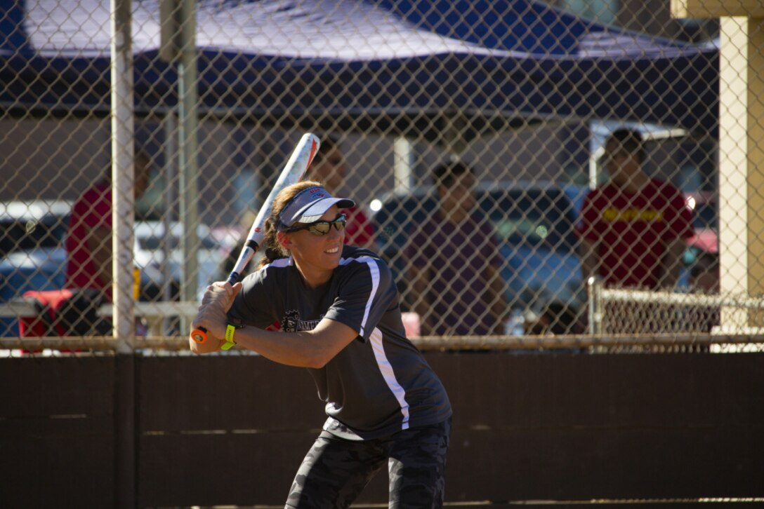 Lieutenant Colonel Chritine Houser, the commanding officer of Headquarters and Headquarters Squadron, Marine Corps Air Station Miramar, steps up to the plate during the H&HS softball tournament at MCAS Miramar, San Diego, California, Jan. 15, 2021. Headquarters and Headquarters Squadron held a slow-pitch softball tournament for the January warrior games to build morale and unit camaraderie. (U.S. Marine Corps photo by Cpl. Andrew Hiatt)