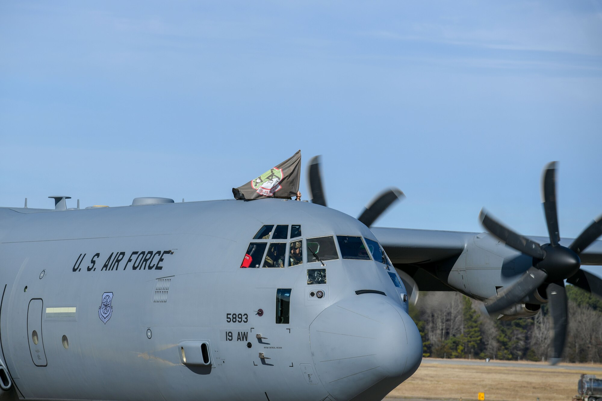 An aircraft taxis to its parking spot