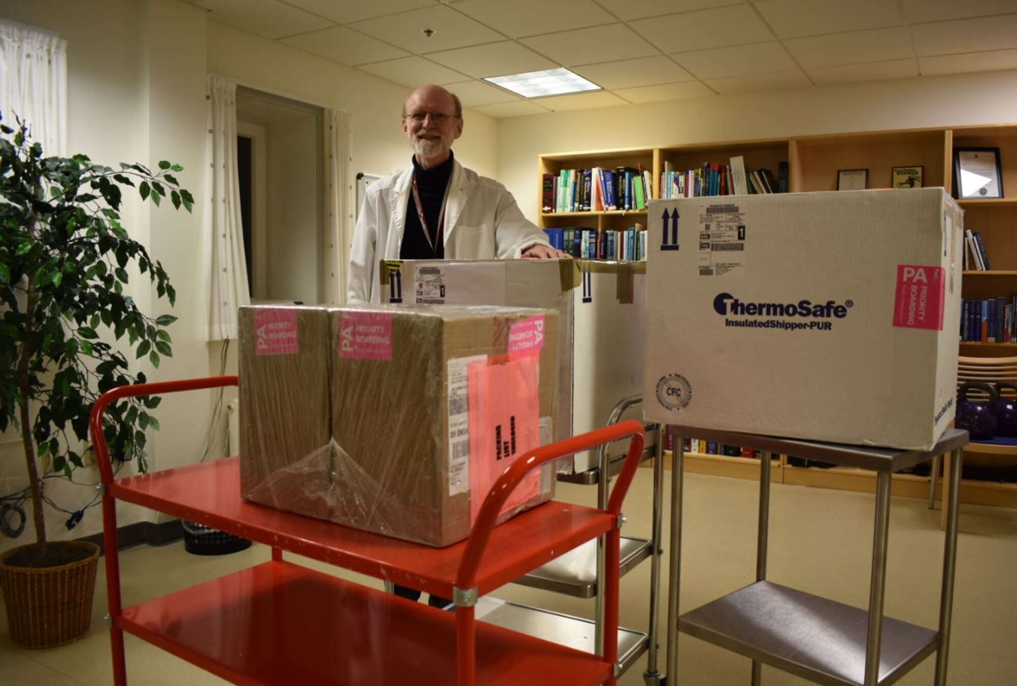 Doctor is next to box