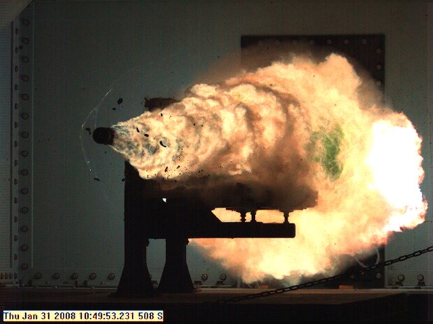 IMAGE: Photograph taken from a high-speed video camera during a record-setting firing of an electromagnetic railgun (EMRG) at Naval Surface Warfare Center, Dahlgren, Va., on January 31, firing at 10.64MJ (megajoules) with a muzzle velocity of 2520 meters per second. The Office of Naval Research's EMRG program is part of the Department of the Navy's Science and Technology investments, focused on developing new technologies to support Navy and Marine Corps war fighting needs. This photograph is a frame taken from a high-speed video camera.