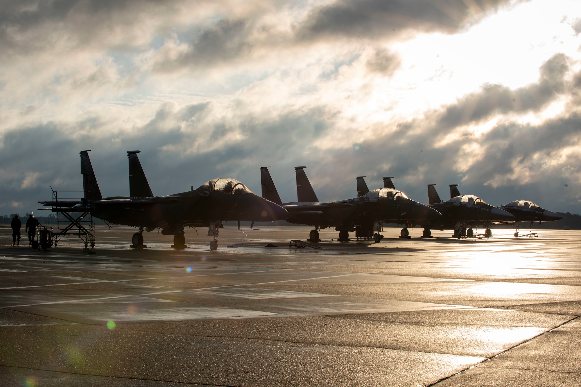 Snow melts off of F-15E Strike Eagles at Seymour Johnson Air Force Base, North Carolina, Jan. 28, 2021.