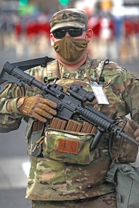 Soldier standing with weapon