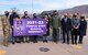 49th Wing leadership and Alamogordo Public School District leadership pose for a photo with Purple Star School Designate banner, Jan. 19, 2021, at Alamogordo, New Mexico. The designation is for two years and it allows the campus to carry the banner of Alamogordo public schools Purple Star on their campus and on its website. (U.S. Air Force photo by Airman 1st Class Jessica Sanchez)
