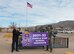 Jerrett Perry, Alamogordo Public School District Superintendent, and Col. Ryan Keeney, 49th Wing commander, pose for a photo with Purple Star School Designate banner, Jan. 19, 2021 at Alamogordo, New Mexico. The Alamogordo Public School Purple Star banner is a symbol exhibiting that the schools are military-friendly campuses that have specifically trained members to help transition and support military students who attend Alamogordo public schools. (U.S. Air Force photo by Airman 1st Class Jessica Sanchez)