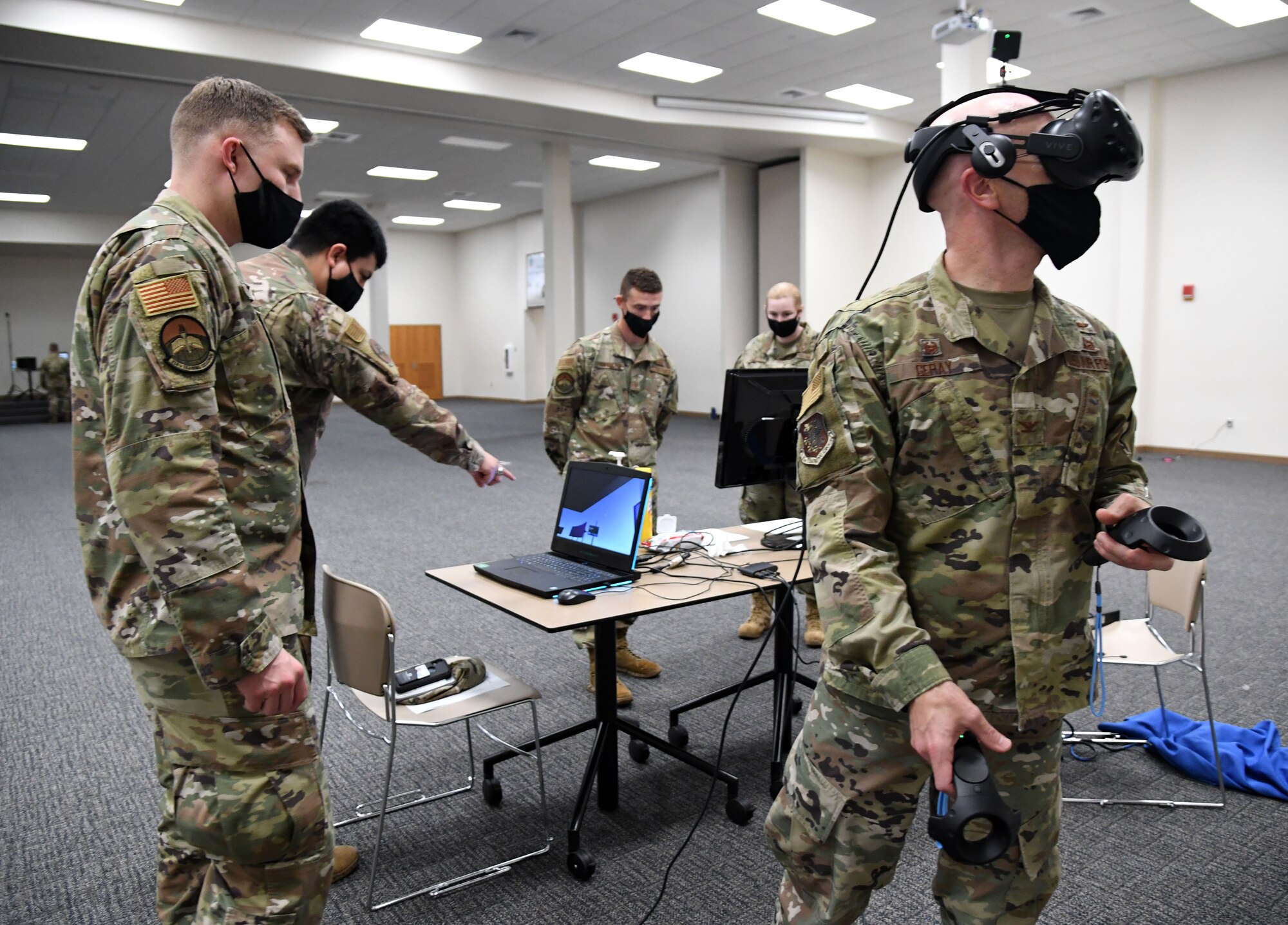 U.S. Air Force Col. Chance Geray, 81st Training Group commander, participates in a 334th Training Squadron air traffic control tower virtual reality demonstration during the 81st TRG Mock Tech Expo inside the Roberts Consolidated Aircraft Maintenance Facility at Keesler Air Force Base, Mississippi, Jan. 27, 2021. The 81st TRG level event was designed to prepare Keesler's nine innovation projects for the Air Education and Training Command level exposition. (U.S. Air Force photo by Kemberly Groue)