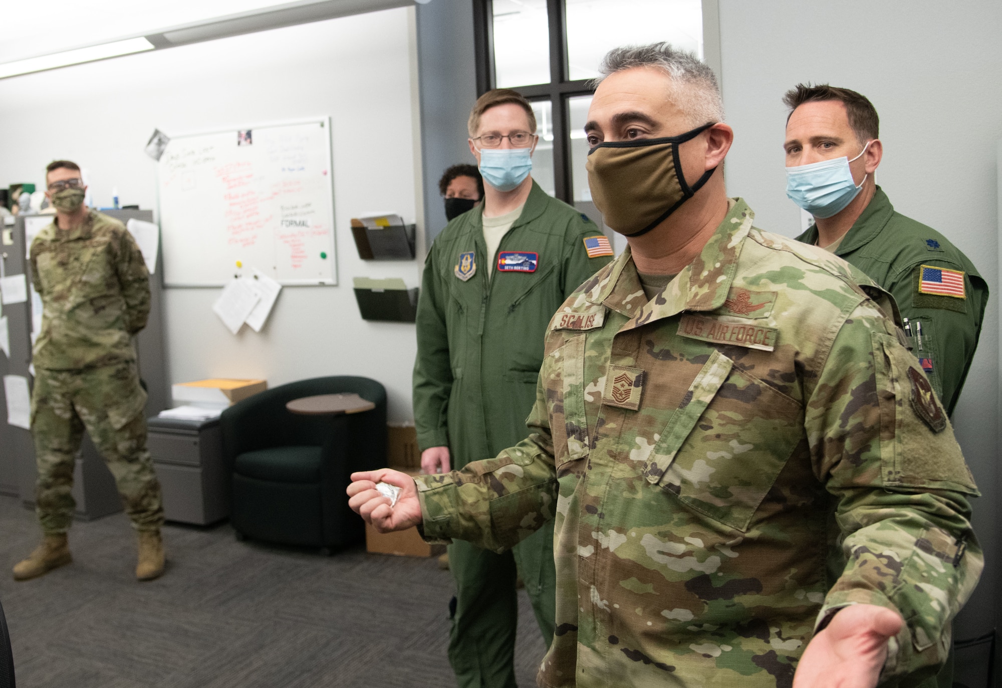 Chief Master Sgt. Kahn Scalise, 302nd Airlift Wing command chief, visits members of the wing and thanks them for their hard work during the unit training assembly Jan. 10, 2021,