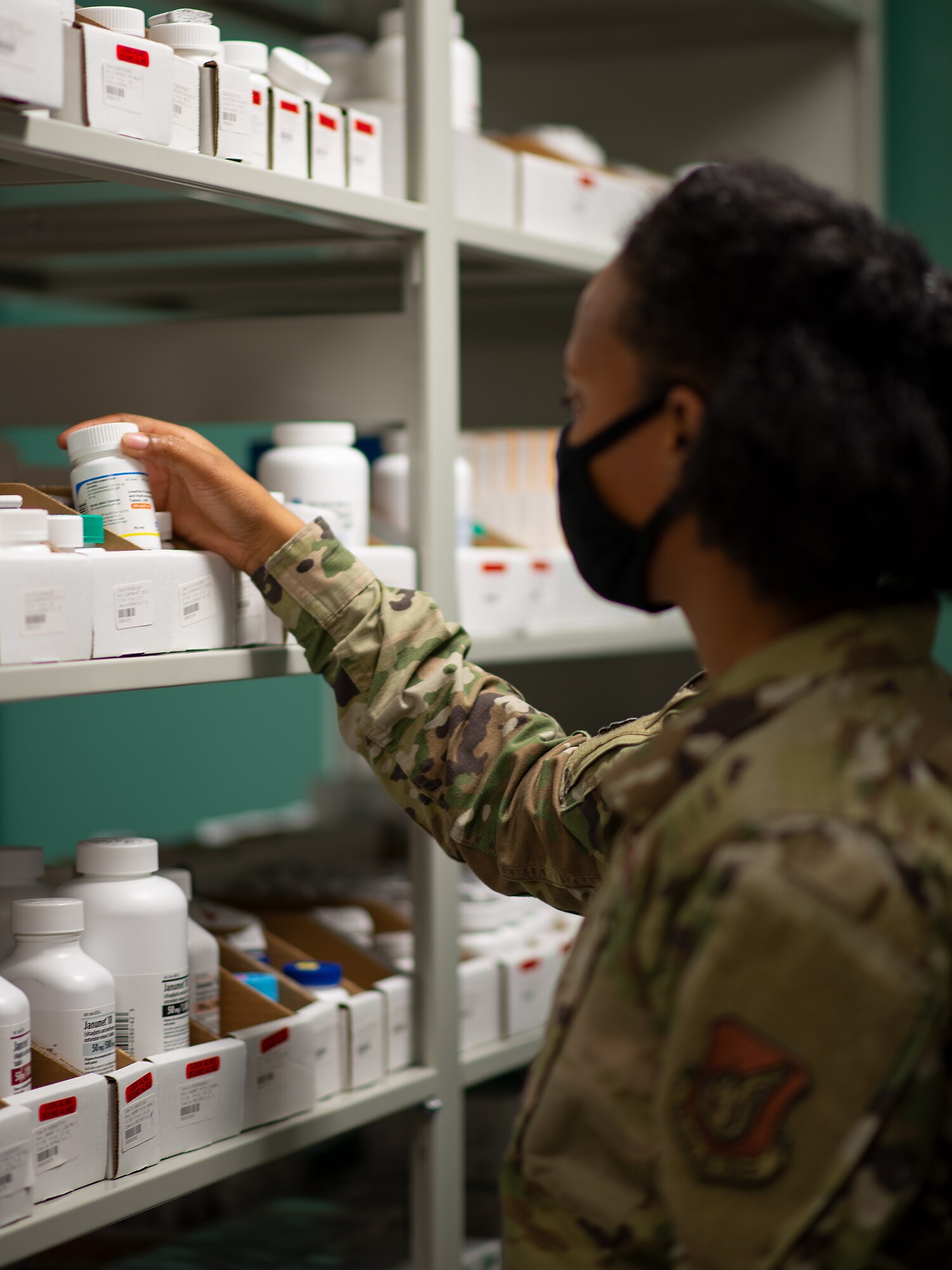Capt. Ciera Williams, 36th Healthcare Operations Squadron chief of pharmacy operations, reads the label on a bottle of medication in the pharmacy at Andersen Air Force Base, Guam, Jan. 28, 2021. During the last week of January, members of Andersen AFB recognized all the hard work done by Airmen in the Biomedical Science Corps in honor of the 56th Annual Biomedical Science Corps Appreciation Week. (U.S. Air Force photo by Airman Kaitlyn Preston)