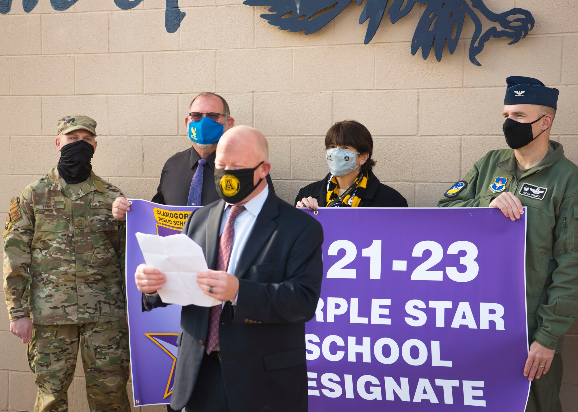 Jerrett Perry, Alamogordo Public School District Superintendent, gives a speech during the Purple Star School Award Designate, Jan. 19, 2021, on Holloman Air Force Base, New Mexico. The Purple Star Award for military-friendly schools recognizes schools that show a major commitment to students and families connected to United States military. (U.S. Air Force photo by Airman 1st Class Jessica Sanchez)
