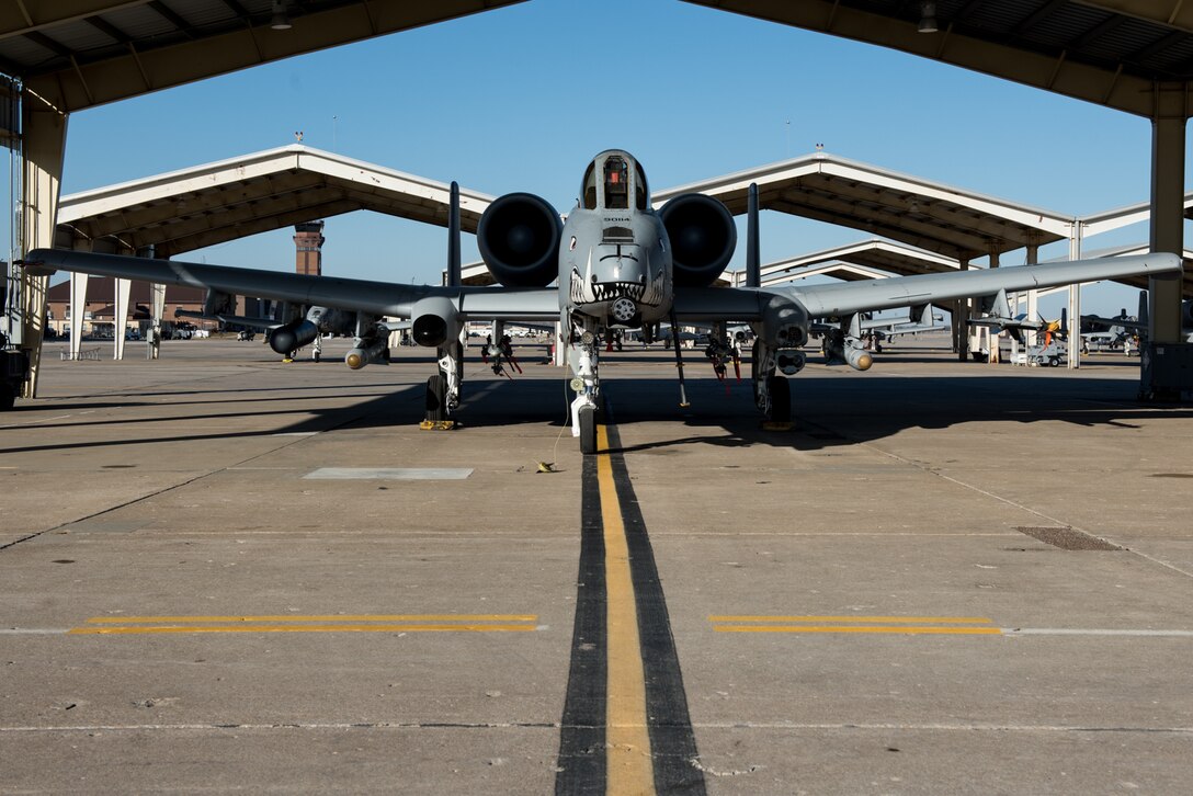 An A-10 Thunderbolt II sits under the hardstand at Whiteman Air Force Base, Missouri, Jan. 12, 2021. The Fiscal Year 2024 Defense Logistics Agency Military Construction project will enable A-10 Thunderbolt II aircraft to hot-pit using pantographs once the aircraft hydrant outlet pits are completed. (U.S. Air Force photo by Airman 1st Class Christina Carter)