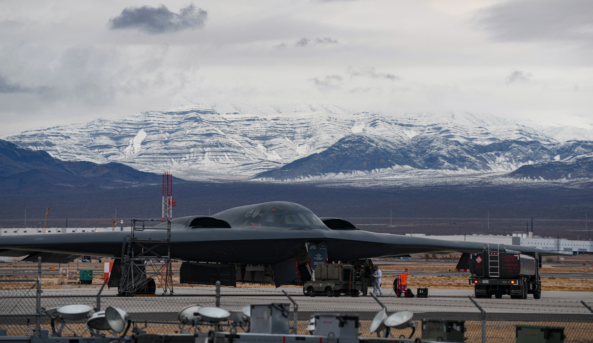Team Whiteman Airmen prepare a B-2 Spirit Stealth Bomber for a training mission during Red Flag 21-1, at Nellis Air Force Base, Nevada, Jan. 26, 2021. Team Whiteman brought approximately a hundred Airmen to participate in the large force exercise and to be the lead Wing. As the lead Wing, RF 21-1 enables Team Whiteman to maintain a high state of readiness and proficiency, while validating their always-ready global strike capability. (U.S. Air Force photo by Staff Sgt. Sadie Colbert)