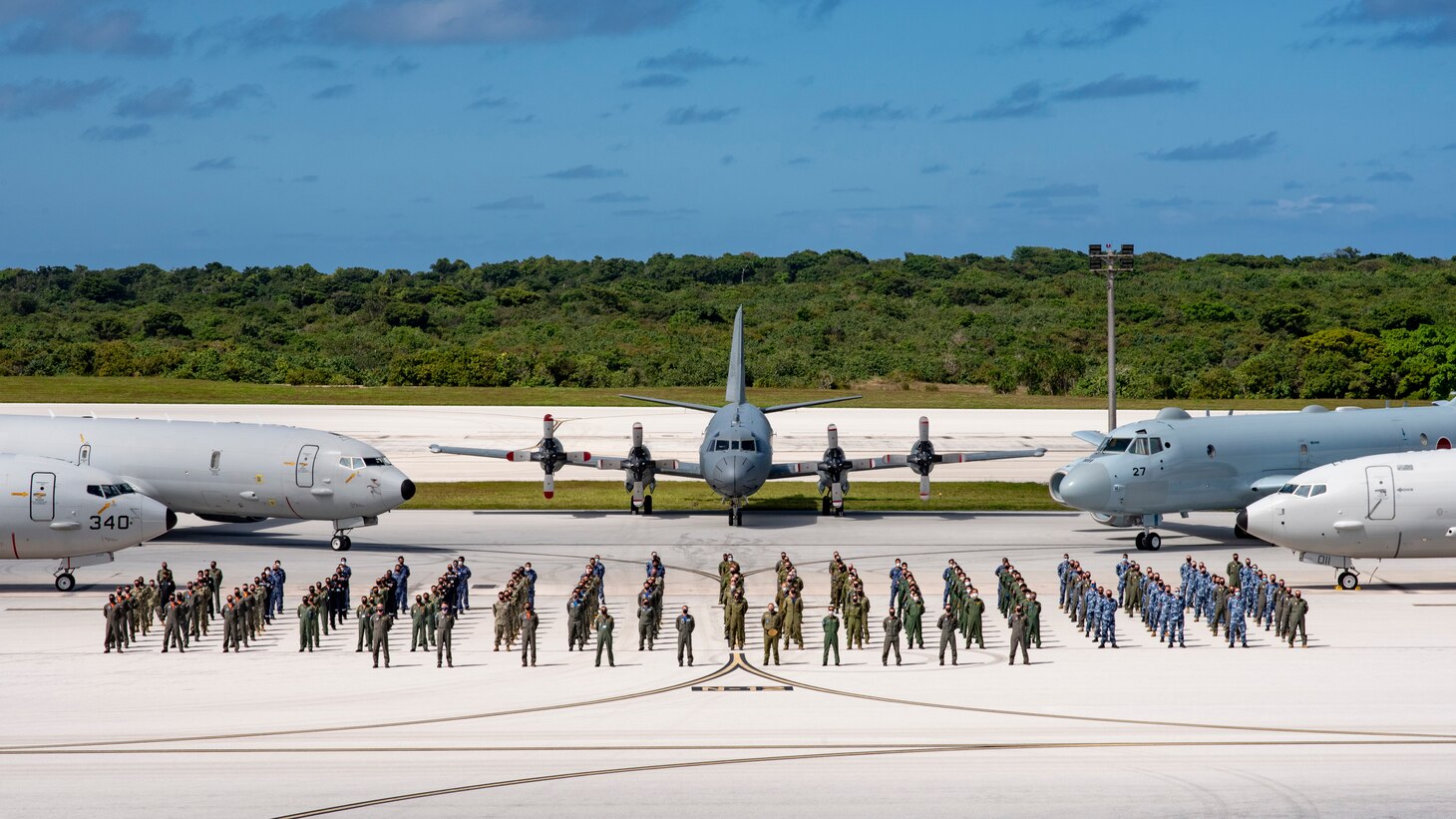 ANDERSEN AIR FORCE BASE, Guam (Jan. 28, 2021) Members of the Royal Australian Air Force (RAAF), Japan Maritime Self Defense Force (JMSDF), Indian Navy (IN) and the Royal Canadian Air Force (RCAF), along with Patrol Squadron (VP) 5's "Mad Foxes" and VP 8's "Fighting Tigers", pose for a photo at the conclusion of Exercise Sea Dragon. Sea Dragon is an annual multi-lateral anti-submarine warfare exercise that improves the interoperability elements required to effectively and cohesively respond to the defense of a regional contingency in the Indo-Pacific, while continuing to build and strengthen relationships held between nations . As the U.S. Navy's largest forward-deployed fleet, 7th Fleet employs 50 to 70 ships and submarines across the Western Pacific and Indian Oceans. U.S. 7th Fleet routinely operates and interacts with 35 maritime nations while conducting missions to preserve and protect a free and open Indo-Pacific region. (U.S. Navy photo by Lt. Cmdr. Kyle Hooker)