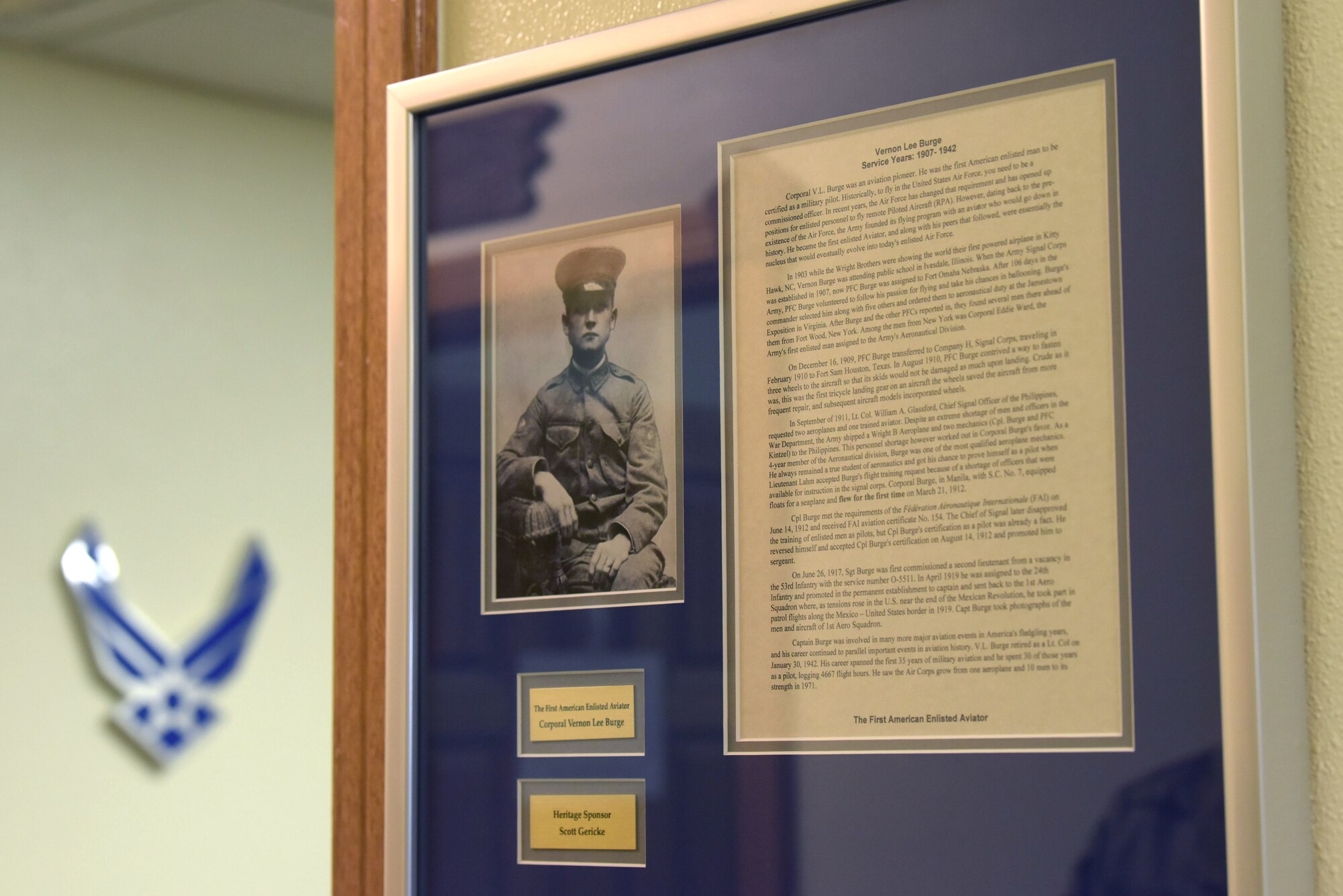 Cpl. Vernon Lee Burge’s photo hangs on a wall of a McDaniel Center classroom, Jan. 8, 2021, at Kadena Air Base, Japan. Burge was the first American enlisted man to be certified as a military pilot, he was a pioneer in aviation and an innovator. (U.S. photo by Airman 1st Class Rebeckah Medeiros)