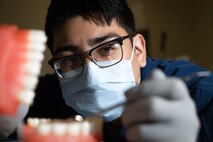 HM Elijah M. Molinaerario, a Dental Assistant with H-1 Dental Clinic, 2D DENTAL BN, 2D MLG, poses for a photo on Camp Lejeune, N.C., January 29, 2021. ""Always display the leadership qualities of the type of leader that you would want to follow.," said Molinaerario, a Rialto, Calif., native. According to his leadership, HN Molinaerario has been a great ambassador for 2D DENBN while attached to Weapons Training Battalion (WTBN).  He provided 85 hours of medical coverage for 65 Marines conducting range operations. He conducted 5 classes of annual training courses which included Marine History, Clothing items, TCCC, Application of a tourniquet, and Organization of a MAGTF for 27 Marines and 1 Sailor. He volunteered to set-up and breakdown for the WTBN Change of Command ceremony contributing to a safe and successful event for 42 attendees. HN Molina's eagerness to learn new tasks, stalwart motivation and his steadfast work ethic have earned him his selection as the 2D MLG Motivator of the Week! (U.S. Marine Corps photo by Lance Cpl. Zachary Zephir)