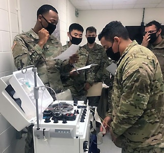 Sgt. Kevin Hughes provides instruction during the 95th Medical Detachment-Blood Support’s training on apheresis platelet collection on Dec. 11 at Camp Humphreys, South Korea.