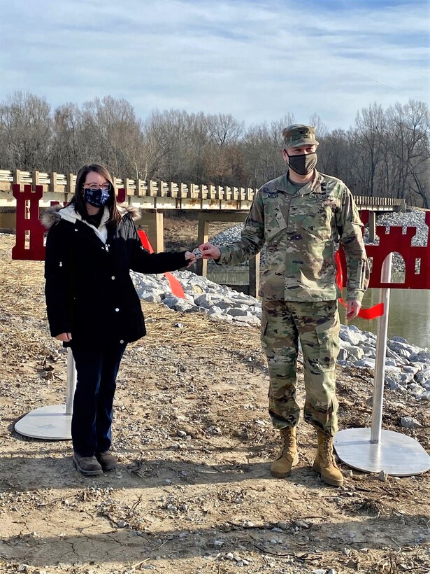 IN THE PHOTO, Memphis District Commander Col. Zachary Miller coins Project Manager Amber Jarnagin for her excellent performance in executing this project.  (USACE photos by Jessica Haas)