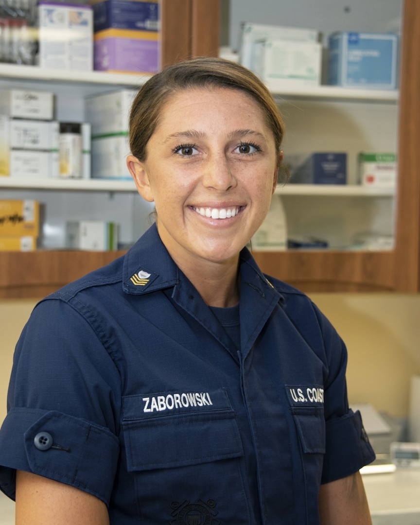Petty Officer 1st Class Shelby Zaborowski from Coast Guard Air Station Clearwater receives the Clinic Health Services Technician of the Year Award for 2020. Zaborowski was recognized for her outstanding direct patient care and mission readiness during Hurricane Dorian response operations in September 2019. U.S. Coast Guard photo by Petty Officer 1st Class Ayla Hudson.