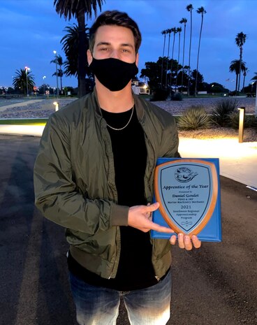 Daniel Goulet, marine machinery mechanic, Shop 38, Puget Sound Naval Shipyard & Intermediate Maintenance Facility, was selected as the Apprentice of the Year for the class of 2021. The Southwest Regional Apprentice Program graduated 11 apprentices during an outdoor, drive-through commencement ceremony Jan. 28, 2021, in San Diego.