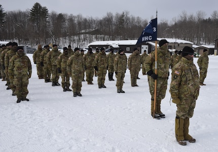 Soldiers with Headquarters Company, 3rd Battalion, 172nd Infantry, stand at attention during a sendoff ceremony Jan. 29, 2021, at the Camp Ethan Allen Training Site parade field in Jericho, Vermont. The 3-172nd, part of the Vermont National Guard's 86th Infantry Brigade Combat Team (Mountain), will deploy to the U.S. Central Command area of operations for about a year starting in February. (U.S. Army National Guard photo by Don Branum)