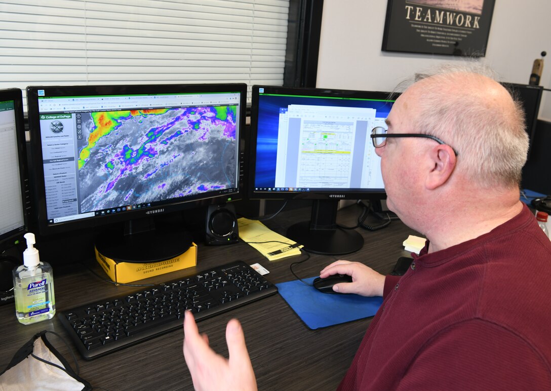 Photo of man at computer