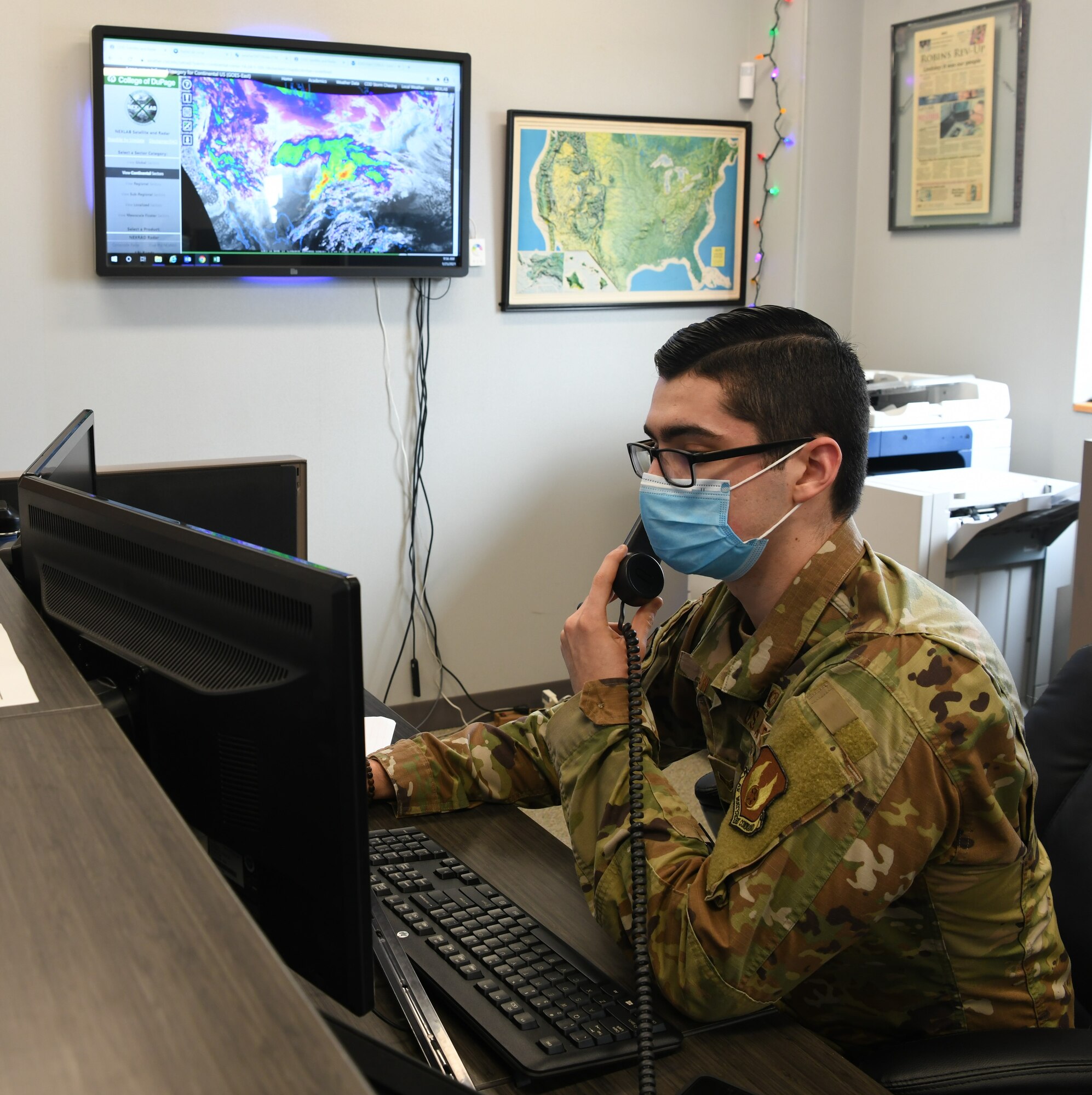 Photo of man at computer