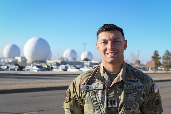 U.S. Space Force Capt. Angelo Centeno, 2nd Space Warning Squadron weapons and tactics flight commander, poses for a picture in front of the Radomes at Buckley Air Force Base, Colo., Jan. 27, 2021.