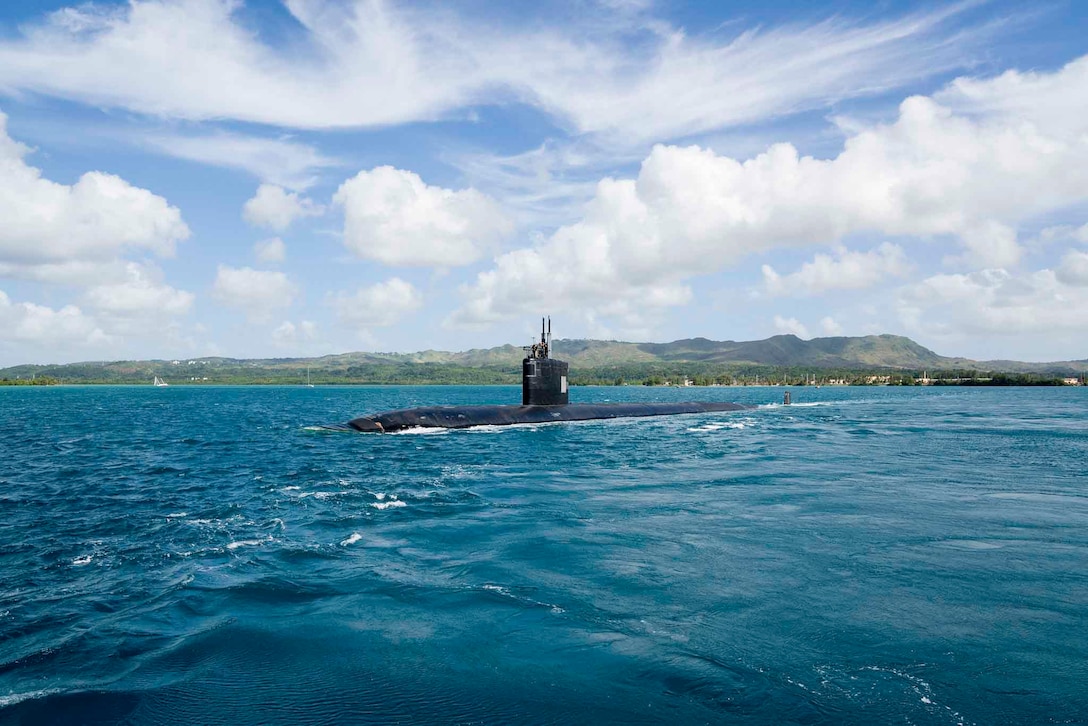 A submarine travels through waters.