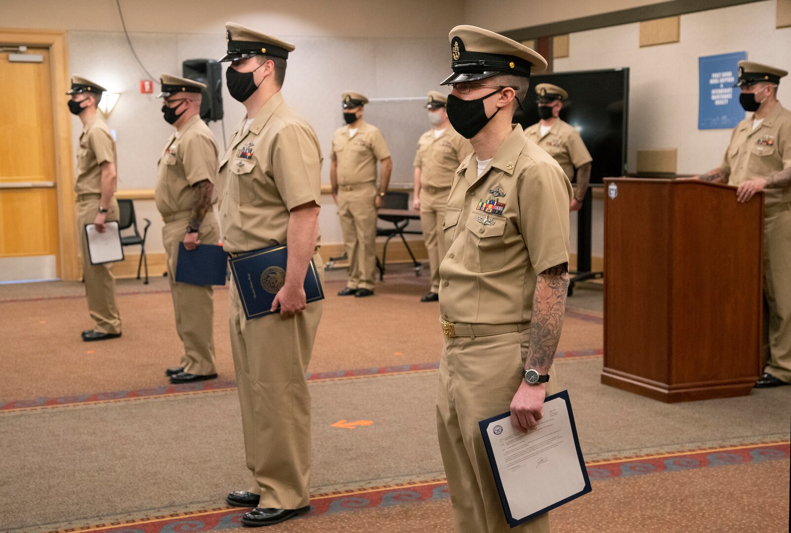 Chief Petty Officer selects Matthew Bernstein, Devin Donohue, Austin Rhodes and Mark Robbins, with Puget Sound Naval Shipyard & Intermediate Maintenance Facility, were pinned to the rank of chief petty officer during a ceremony Jan. 29, 2021, at Olympic Lodge on Naval Base Kitsap-Bremerton, Washington. The ceremony had limited attendees, with participants and attendees socially distanced to adhere to COVID-19 protective protocols.