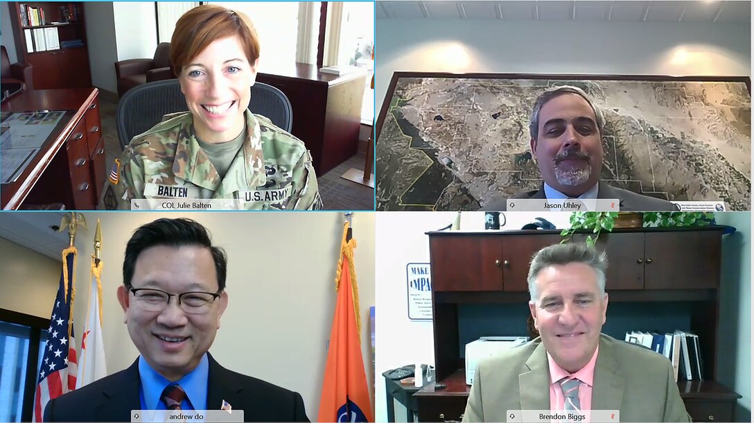 Col. Julie Balten, commander of the U.S. Army Corps of Engineers Los Angeles District, top left; Jason Uhley, chief engineer for the Riverside County Flood Control and Water Conservation District, top right; Andrew Do, chairman of the Orange County Board of Supervisors, bottom left; and Brendon Biggs, director of the Department of Public Works for the San Bernardino Flood Control District, bottom right, were all smiles after Balten signed an amendment to the Local Cooperation Agreement between the Department of the Army and  three county flood control districts for the Corps’ Santa Ana River Mainstem project during a Jan. 28 virtual ceremony.