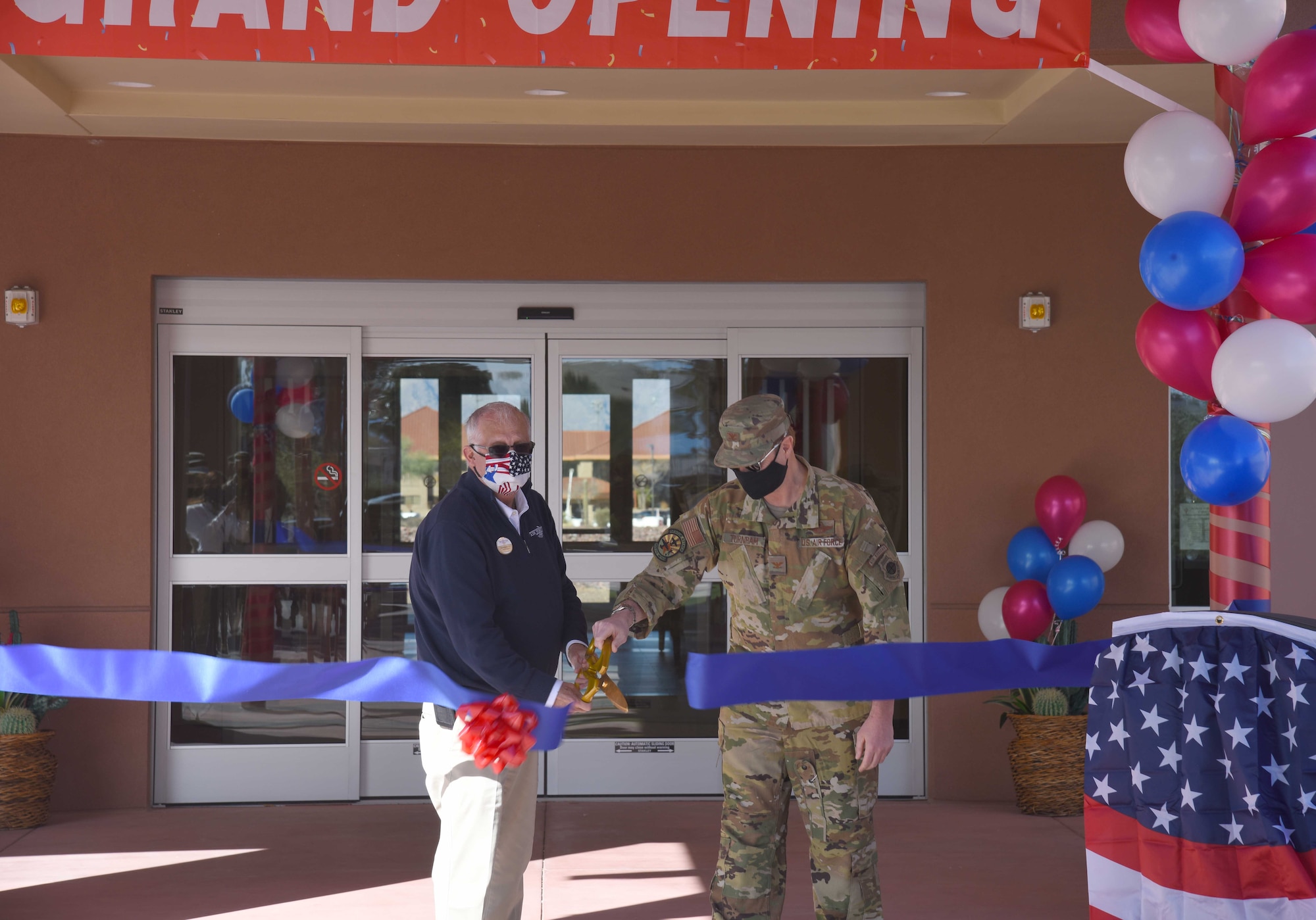 a photo of the wing commander at a ribbon cutting