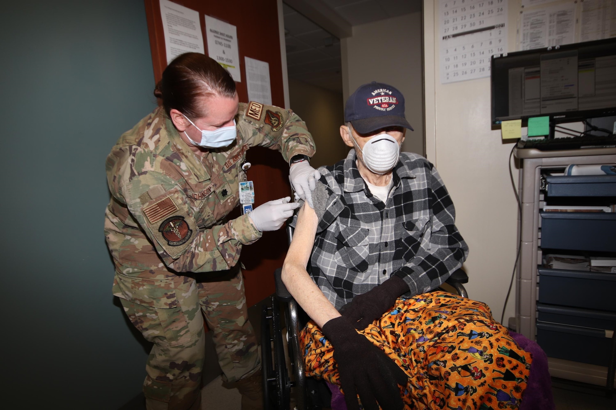U.S. Air Force Lt. Col. Amy Johnson, the 673d Healthcare Operations Squadron Medicine Flight commander, administers the first of a two-dose series of a COVID-19 vaccine to a TRICARE beneficiary at Joint Base Elmendorf-Richardson, Alaska, Jan. 29, 2021. JBER is inoculating personnel following the Department of Defense’s prioritization guidelines. The vaccines are part of Operation Warp Speed, a national initiative to accelerate the development, production and distribution of safe and effective COVID-19 vaccines, therapeutics and diagnostics.
