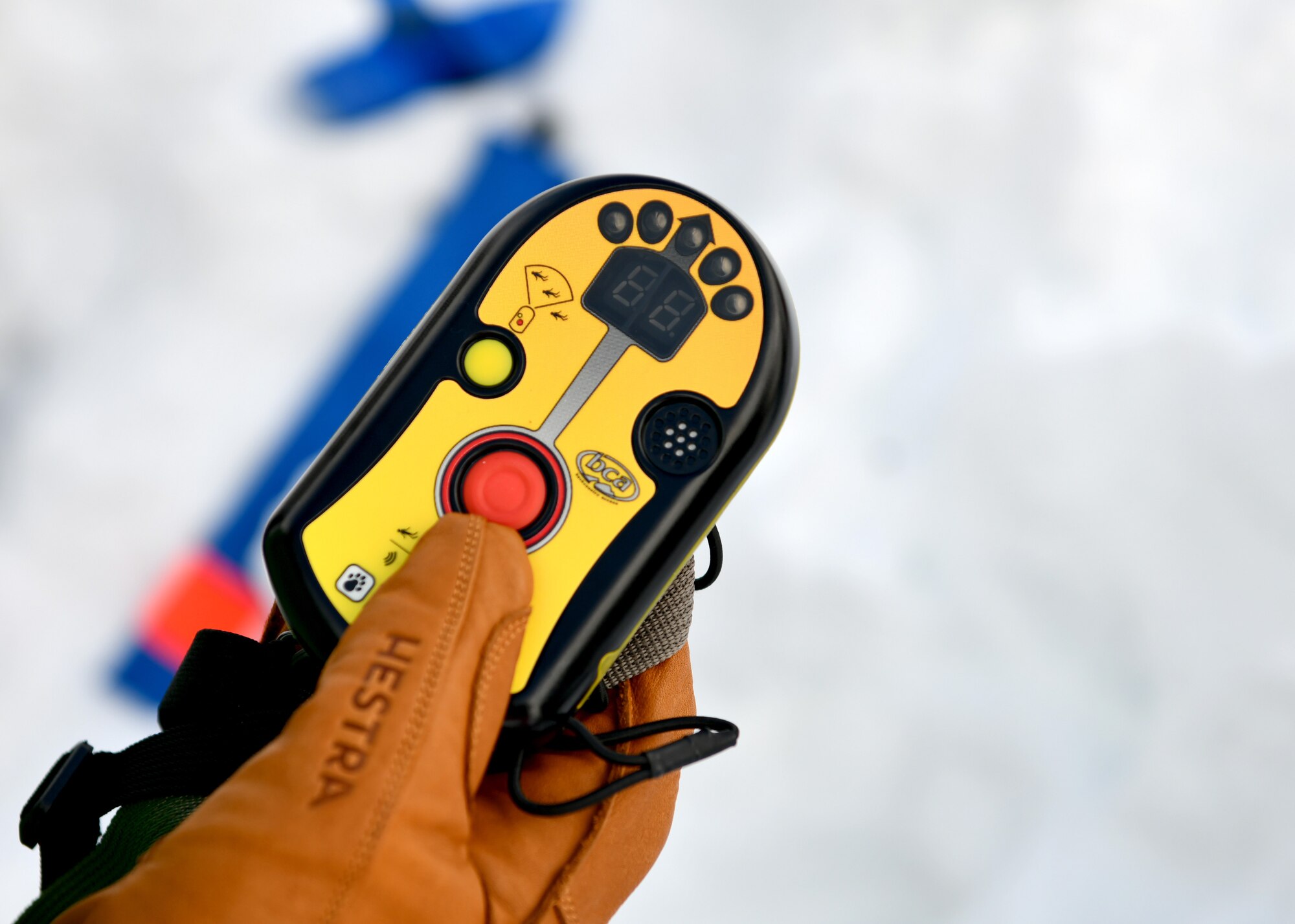 A U.S. Airman assigned to the 31st Fighter Wing at Aviano Air Base, Italy, prepares an avalanche beacon during an avalanche theory class at Piancavallo, Italy, Jan. 20, 2021. The beacon is used by rescuers to search for a person who has been caught in an avalanche. (U.S. Air Force photo by Staff Sgt. K. Tucker Owen)
