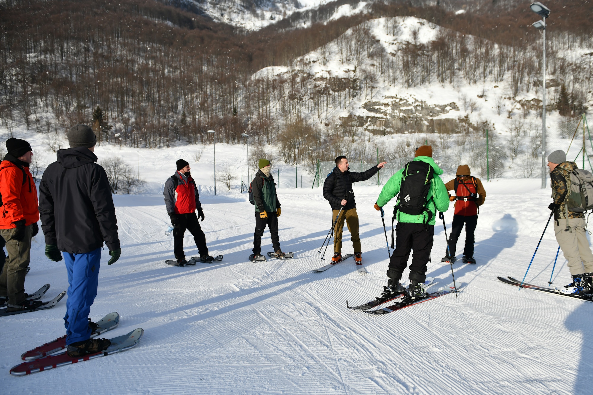 U.S. Airmen assigned to the 31st Fighter Wing at Aviano Air Base, Italy, gather for an avalanche theory class at Piancavallo, Italy, Jan. 20, 2021. The class was part of a week-long exchange between U.S. and Italian air force members intended to increase communication with the host nation, as well as building a foundation of partnership within the international search and recovery community. (U.S. Air Force photo by Staff Sgt. K. Tucker Owen)