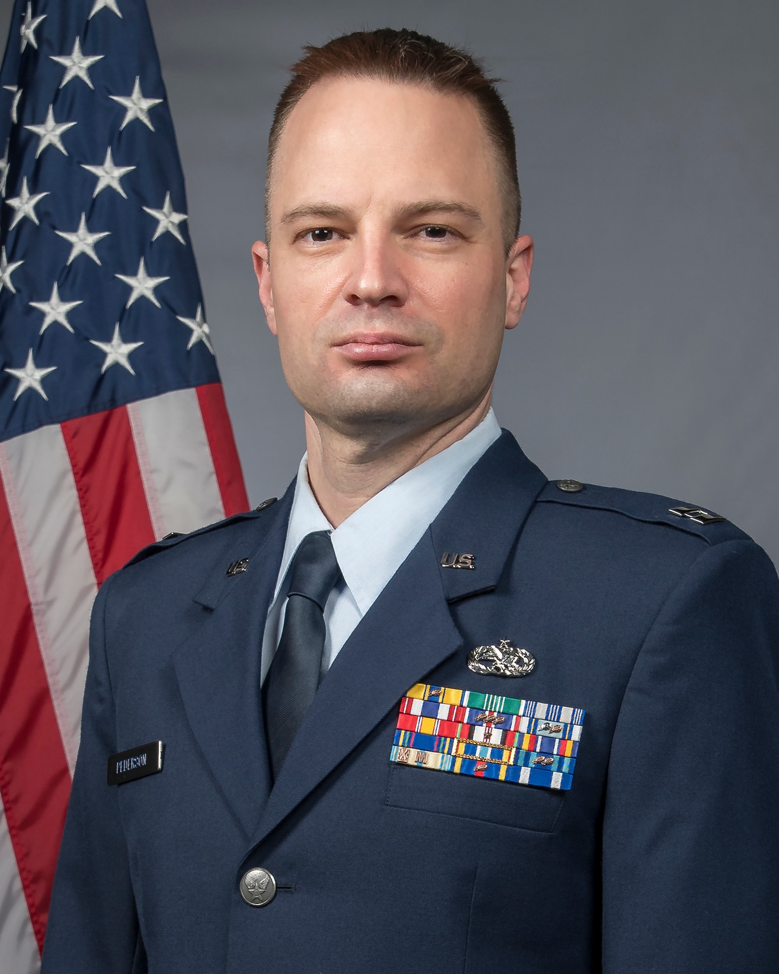 Official Air Force photo for Capt. Ken Pederson. Assigned to the 131st Maintenance Group, Pederson is the 131st Bomb Wing Company Grade Officer of the Year. (U.S. Air National Guard photo by Tech. Sgt. John E. Hillier)