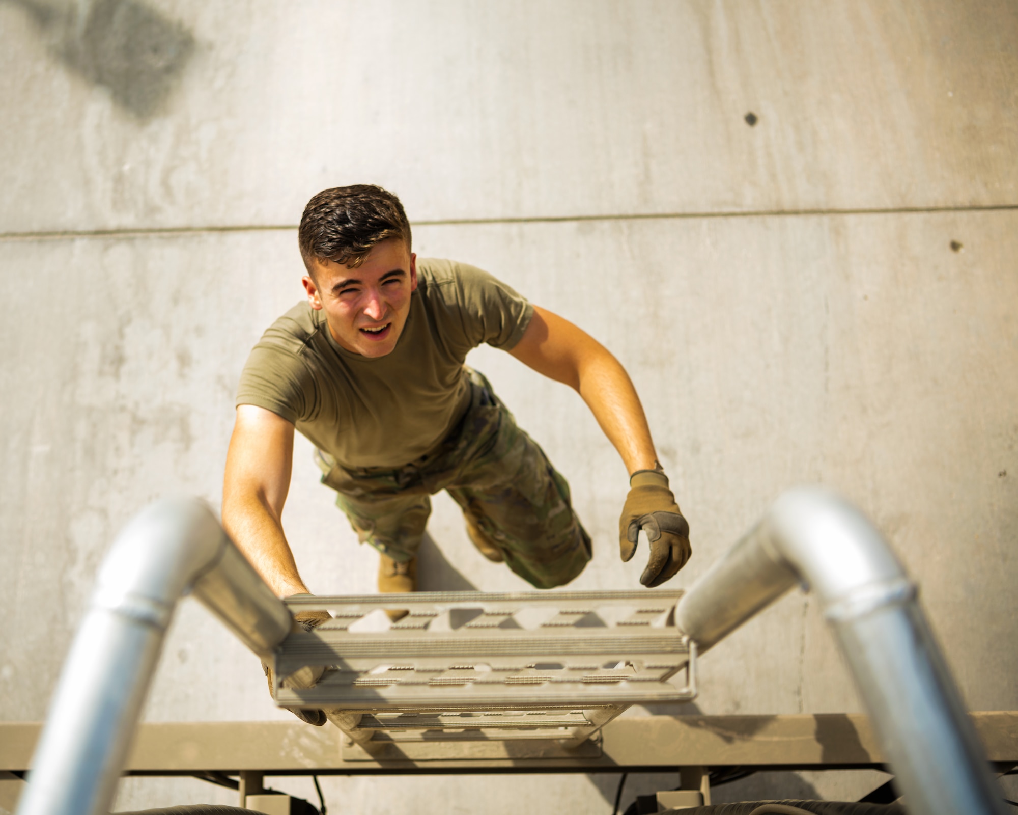 U.S. Air Force Senior Airman Robert Waldbillig, 380th Expeditionary Logistics Readiness Squadron fuels distributor,  fuels aircraft at Al Dhafra Air Base, United Arab Emirates, June 23, 2021.