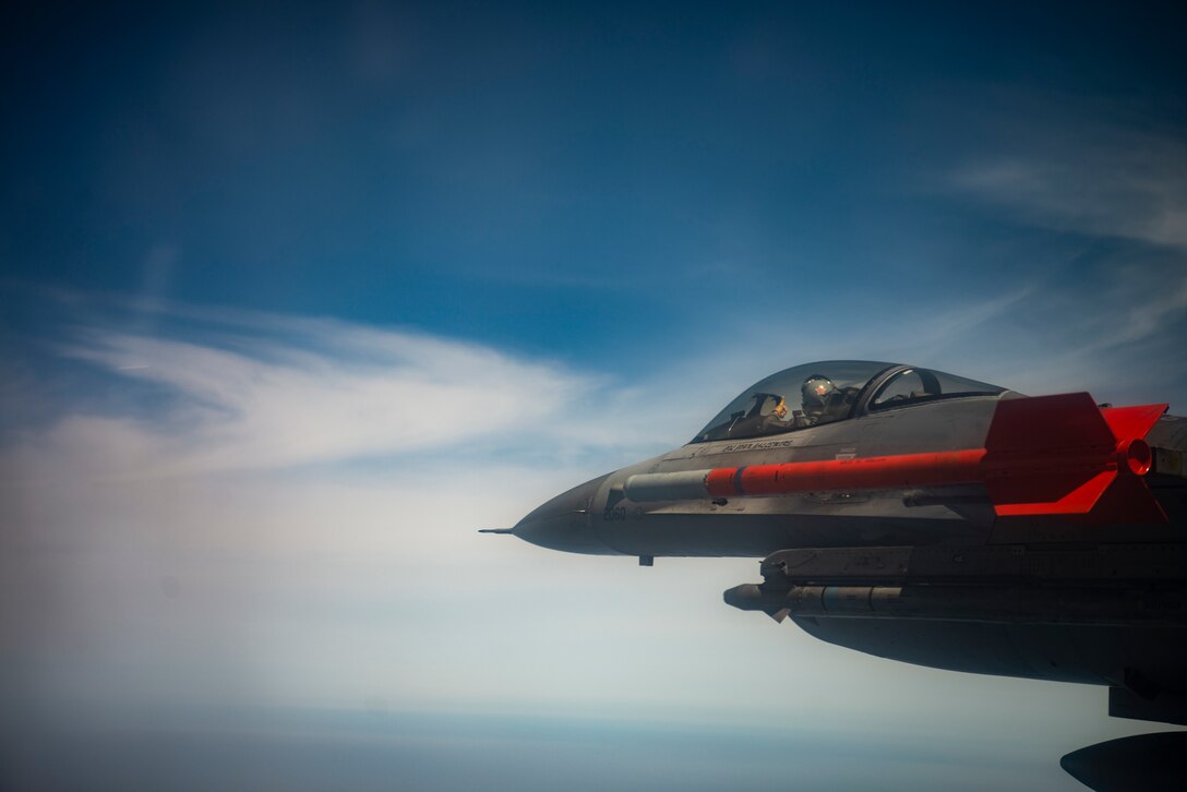 A pilot flies a jet.