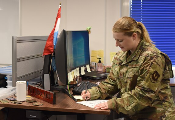 Staff Sgt. Lisa Niel, 86th Material Maintenance Squadron noncommissioned officer in charge of fleet maintenance and analysis, works on a computer at Ramstein Air Base, Germany, June 24, 2021. Niel is responsible for ensuring1,600-vehicles are mission ready and able to be shipped across the European and African theaters. (U.S. Air Force photo by Senior Airman Thomas Karol)