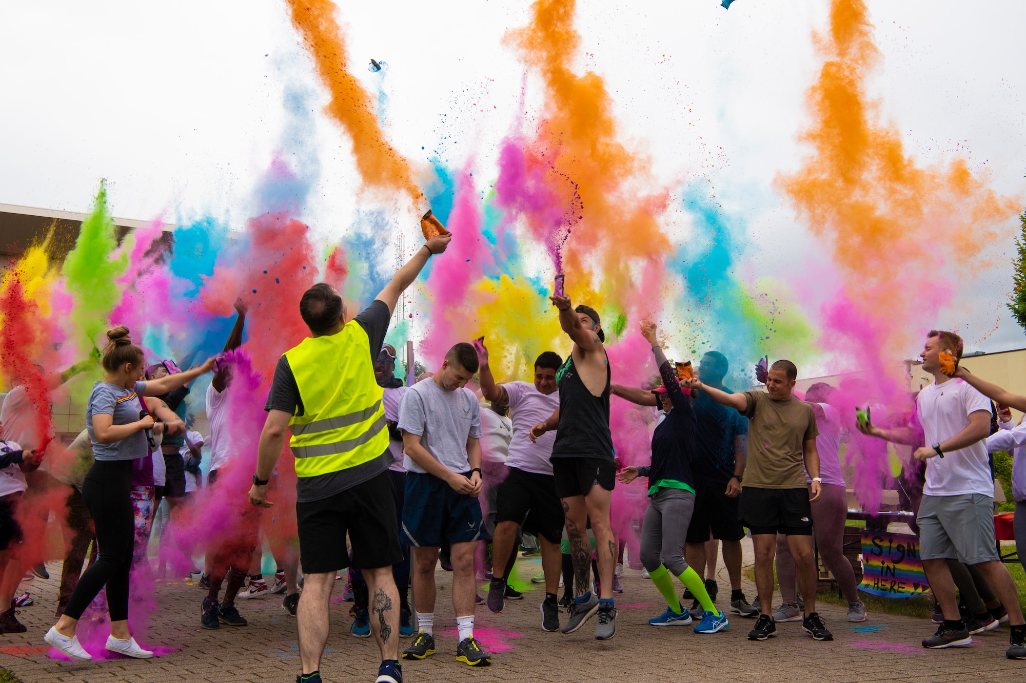 Members from the 52nd Fighter Wing participate in a Pride color run June 30, 2021, on Spangdahlem Air Base, Germany. Held in June each year, Pride Month was established to recognize the equality and increased visibility of the lesbian, gay, bisexual, transgender and queer  community. (U.S. Air Force photo by Staff Sgt. Melody W. Howley)