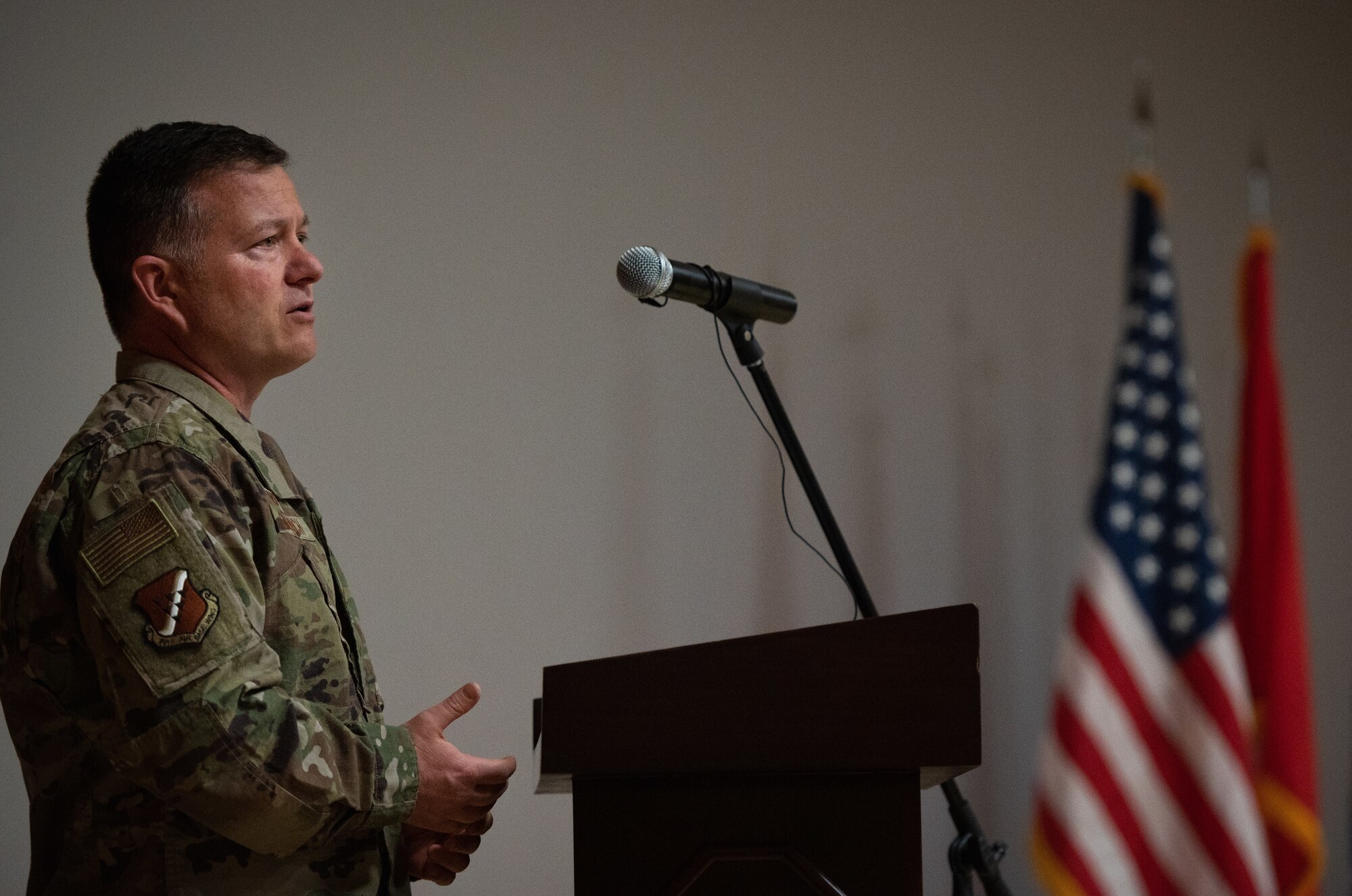 commander speaking at podium