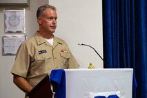 210701-N-IO414-1007 NAVAL SUPPORT ACTIVITY BAHRAIN (July 1, 2021) - Capt. Michael O’Driscoll, outgoing commander of Task Force (TF) 53, delivers remarks during a change of command ceremony onboard Naval Support Activity Bahrain, July 1. TF 53 coordinates replenishment-at-sea efforts and delivers passengers, mail, cargo, ammunition, provisions and fuel throughout the 5th Fleet area of operations via air, land and sea modes, helping to ensure Sailors aboard ships have what they need to complete their missions. (U.S. Navy photo by Mass Communication Specialist 2nd Class Jordan Crouch)