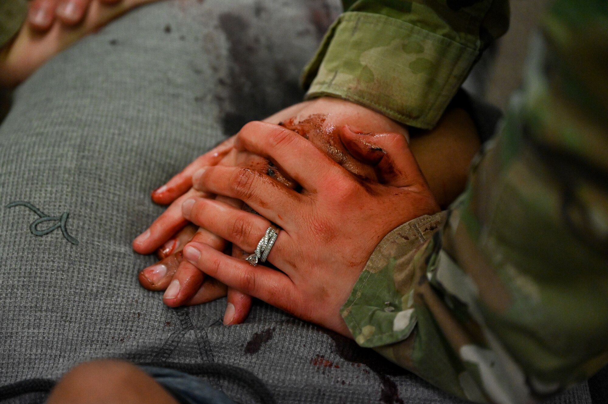 Staff Sgt. Ariel Shannon, 633rd Security
Forces Squadron response force team,
simulates CPR on a victim during an active
shooter exercise at Joint Base
Langley-Eustis, Virginia, June 24, 2021. The
exercise was used to train security forces on
tactics used in real-world situations.