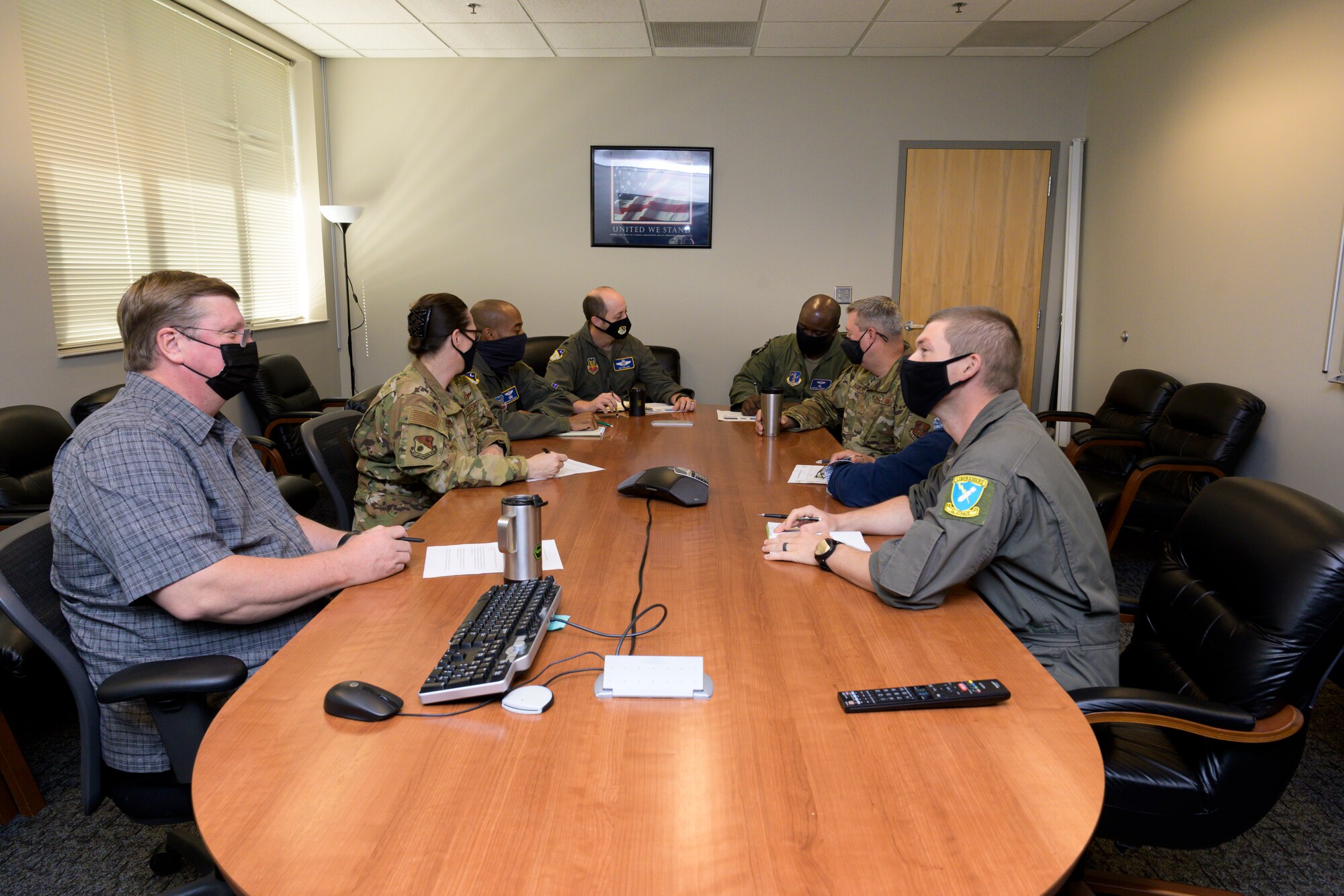 U.S. Airmen, Department of Defense civilians, and contractors with the 116th Air Control Wing plans and programs (XP) office, Georgia Air National Guard, and 461st ACW XP office, hold a staff meeting at Robins Air Force Base, Georgia, May 13, 2021.