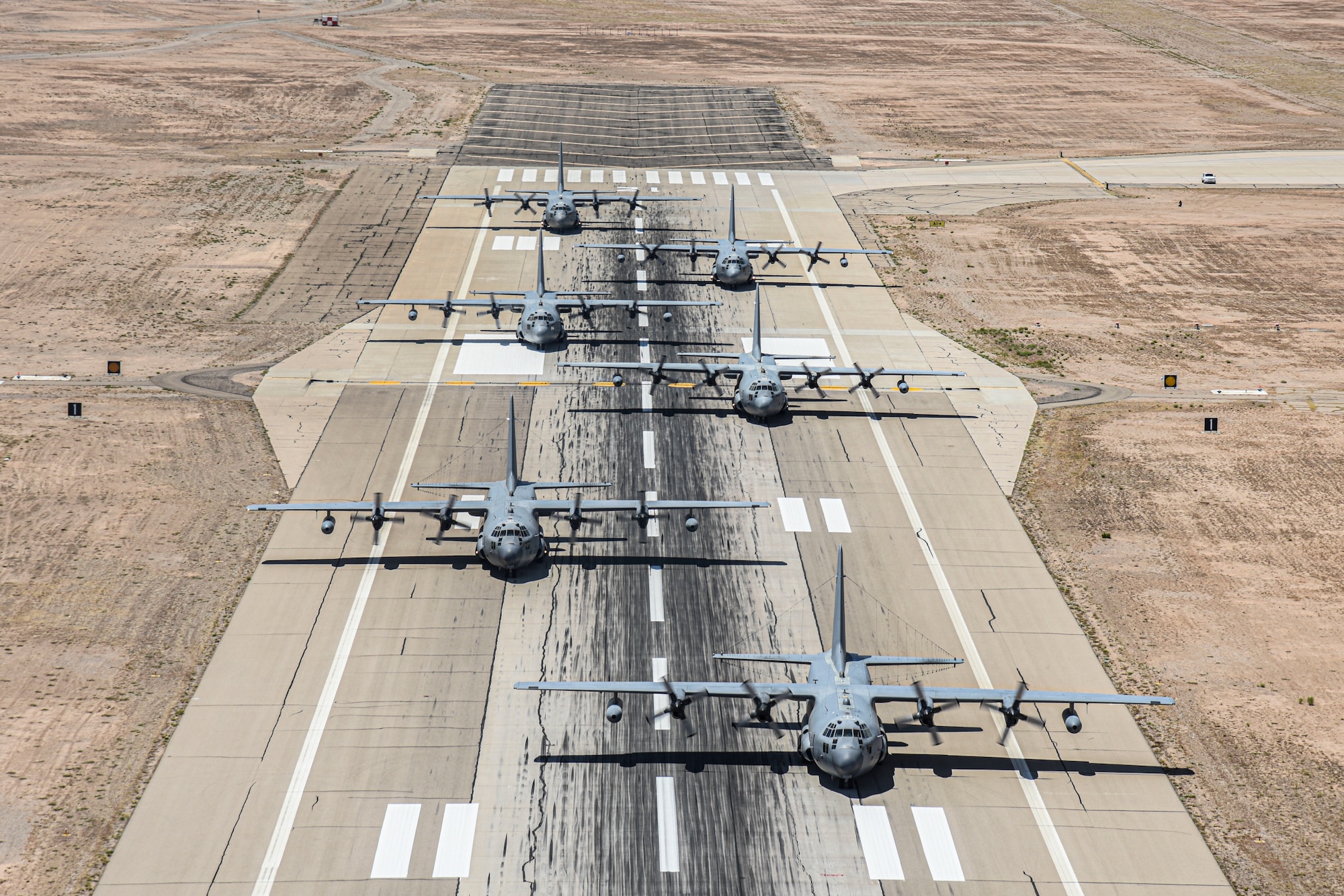 Pictured above is six aircraft lined up on a flight line.