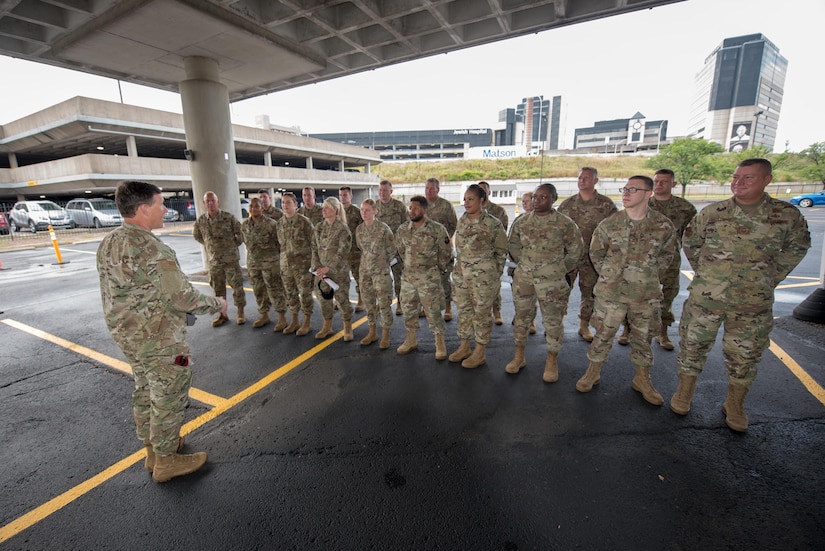 Brig. Gen. Jeffrey Wilkinson, Kentucky’s assistant adjutant general for Air, thanks Airmen from the 123rd Airlift Wing for their support in the fight against COVID at a University of Louisville testing and vaccination site in Louisville, Kentucky, on June 30, 2021. This Guardsmen helped provide 17,160 COVID tests and supported the vaccinations of more than 145,230 citizens at the drive-thru site, which closed June 30. (U.S. Air National Guard photo by Phil Speck)