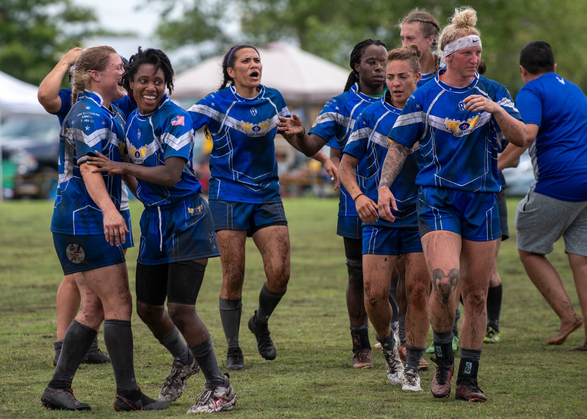 Members of the United States Air Force women’s rugby team gather after winning a match at the Annual Armed Forces Women’s Rugby Championship in Wilmington, North Carolina, June 26, 2021.
