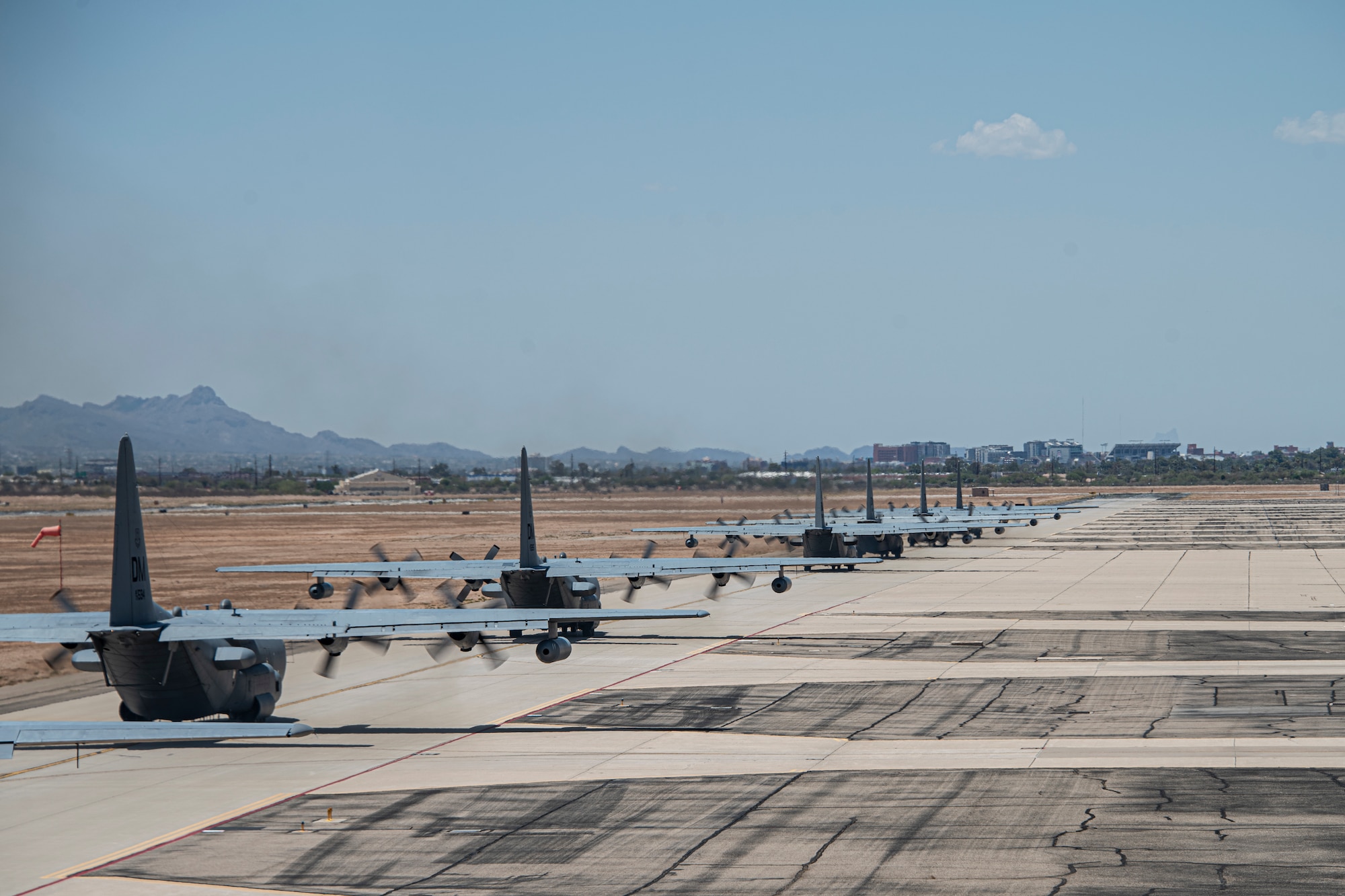 A photo of aircraft taxiing on a runway